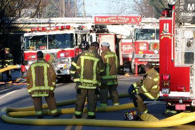 MKFD FF's take a break at Bedford Hills Fire on Route 117. Photo by Frank Beccera. (12/26/08)